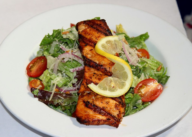 Ceasar Salad topped with Grilled Salmon Ceasar Salad topped with Grilled Salmon